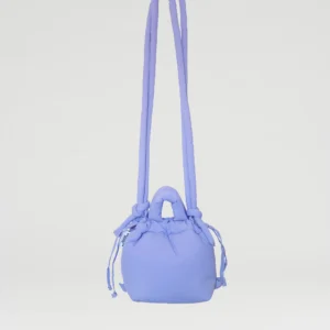 The Micro Ona Soft Bag - Lilac, a small shoulder bag with a long strap and drawstring sides inspired by Estonian design, is displayed against a plain white background. Gate21.ee