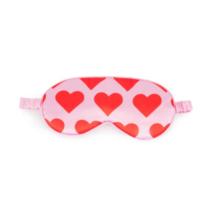 Eye Mask - Love Dream: A pink sleep mask with red heart patterns and elastic strap, featuring charming Estonian design—perfect as a unique Tallinn shopping find. Shown on a white background. Gate21.ee