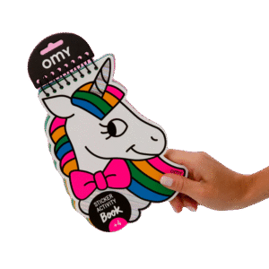 A hand holds the Lily - Sticker Activity Book & Postcards, shaped like a unicorn with a rainbow mane, white face, and pink bow. Curated for Tallinn shoppers, it features spiral binding at the top. Gate21.ee