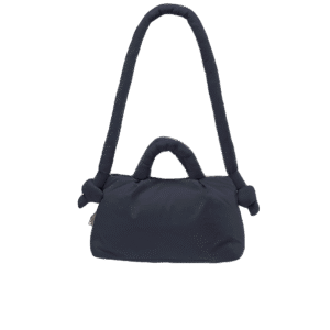 The Mini Ona Soft Bag - Coal is a soft-structured, navy blue handbag with padded handle, thick knotted shoulder strap, and zip fastening. Showcasing Estonian design, it’s a unique find for your favourite gift shop. Gate21.ee