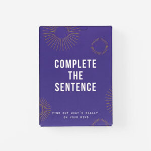 A rectangular purple box with gold sunburst patterns, inspired by Estonian design, features “Complete the Sentence Game” in bold white letters and “Find out what’s really on your mind” in smaller white text at the bottom. Gate21.ee