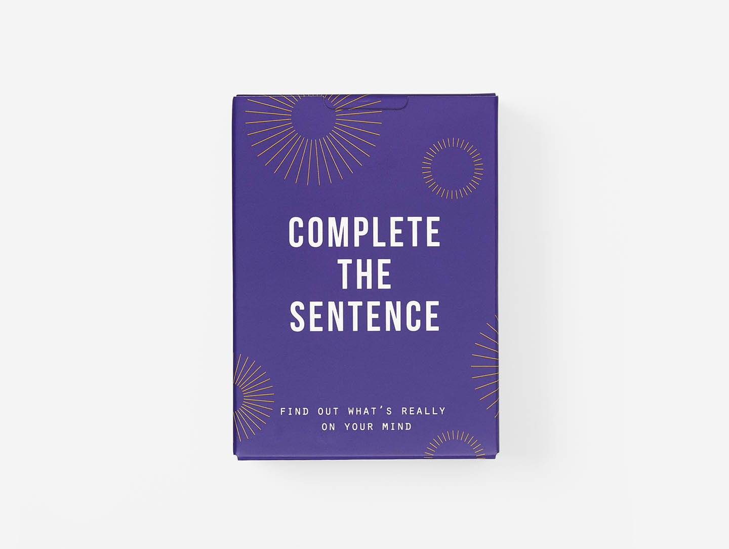 A rectangular purple box with gold sunburst patterns, inspired by Estonian design, features “Complete the Sentence Game” in bold white letters and “Find out what’s really on your mind” in smaller white text at the bottom. Gate21.ee