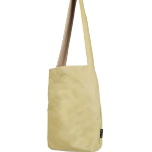 The Feel Good Bag - Violet Ice, a soft and flexible tote with minimalist Estonian design and a long strap, stands upright against a white background—perfect for Tallinn shopping or trips to your favourite concept shop. Gate21.ee