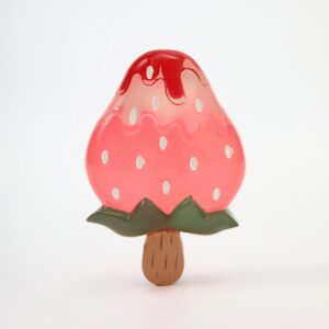 The Fruit Popsockets - K&Otilde;IK features a playful mushroom with a pink cap, white spots, red glaze, green leaves, and a brown stem&mdash;an eye-catching accessory to liven up any Tallinn shopping day or quirky concept shop haul. Gate21.ee