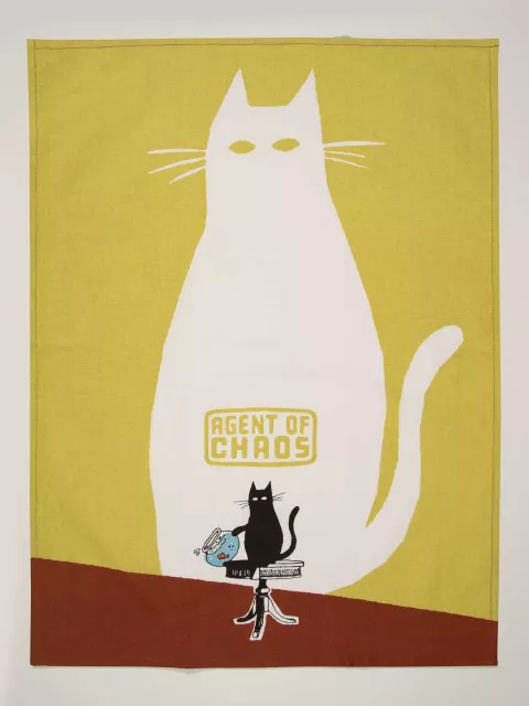 Add playful chaos to your kitchen with the "Agent of Chaos - Tea Towel": a large white cat labelled Agent of Chaos and a small black cat near a spilt glass, set against a yellow-brown background—perfect for Tallinn shopping or concept shops. Gate21.ee
