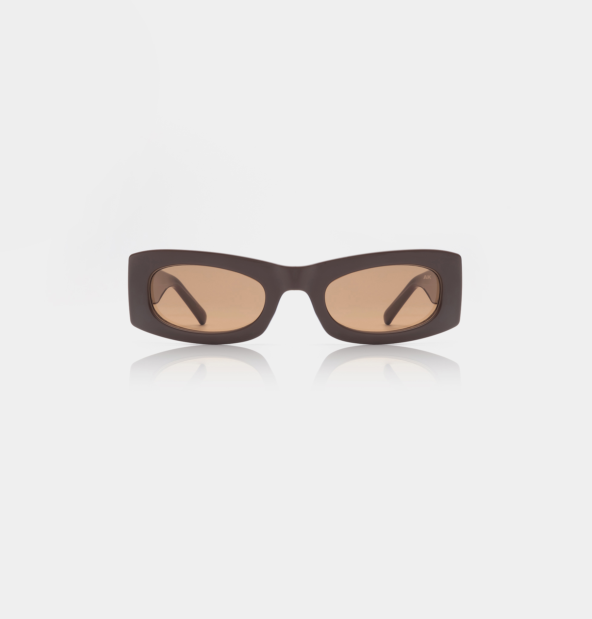 FRIDA - Chocolate: Rectangular dark brown sunglasses with brown-tinted lenses, showcased on a white background—ideal for anyone seeking standout style while shopping in Tallinn or visiting your favourite gift shop. Gate21.ee