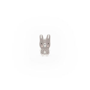 The ABE jewellery - Animals features a small, grey and white toy bunny with simple painted details and dotted patterns, ideal for display in any gift shop or curated concept store. Gate21.ee