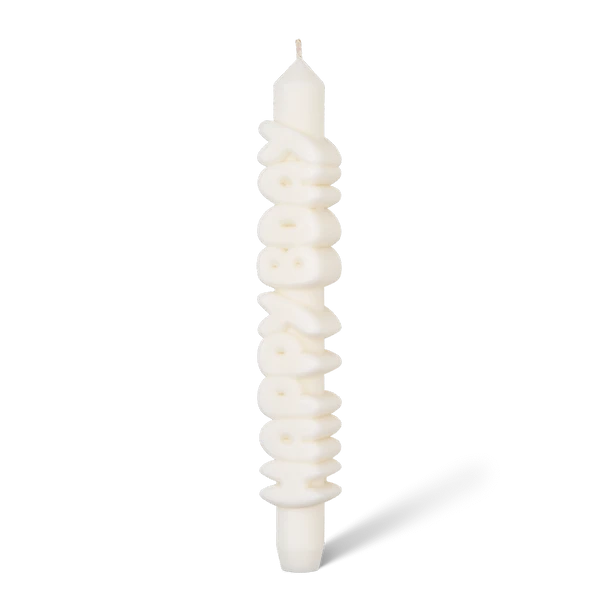 The Happy Bday 3D Candle - Indigo features raised “Happy Birthday” lettering stacked vertically, a sleek smooth finish, and a top wick—an elegant Estonian design perfect for Tallinn shopping or as a standout gift shop find. Gate21.ee