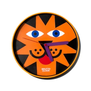 The TIIGER Wall Clock features an orange and black face styled like a lion with blue eyes and purple hands. Showcasing Estonian design, "BRUTTO CLOCK" appears at the bottom—ideal for adding flair to any concept shop. Gate21.ee