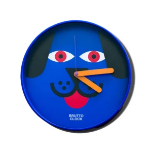 DOGGO - Wall clock: A round wall clock with a blue face, stylised dog illustration, orange hands, red eyes, black ears, and "BRUTTO CLOCK" label. Inspired by Estonian design—perfect for concept shop displays. Gate21.ee