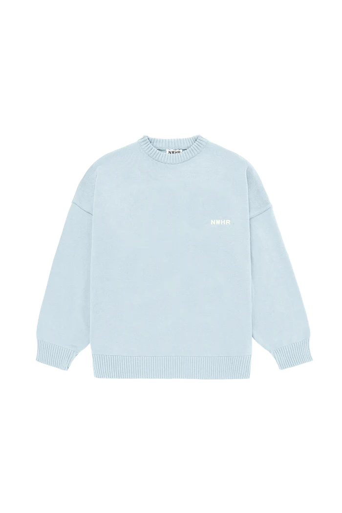 The Jumper - Baby Blue is a crew neck with ribbed cuffs, hem, and collar, plus a small white NMHR logo on the left chest—an ideal pick for Tallinn shopping or as a unique gift shop find. Gate21.ee