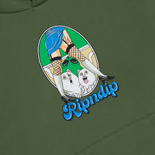 The Nermal Fest hoodie in light olive features a cartoon graphic of a person in a blue skirt, fishnet tights, and boots doing a handstand over two white cats, with "Ripndip" in blue bubble letters printed below. Gate21.ee