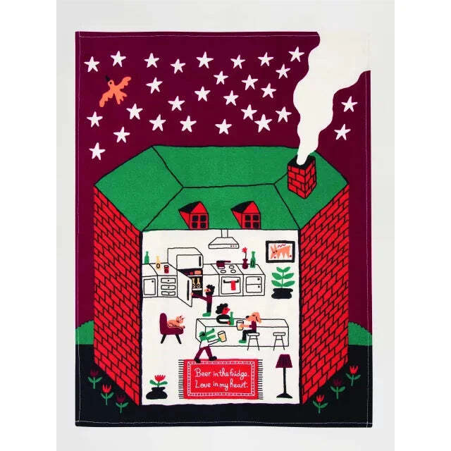 Illustration of a brick house with a green roof. Inside, someone cooks with BlueQ oven gloves. Smoke rises from the chimney under a purple sky with stars and a bird. A sign reads, Beer in the fridge, love in my heart - Beer Fridge Tea Towel. Gate21.ee
