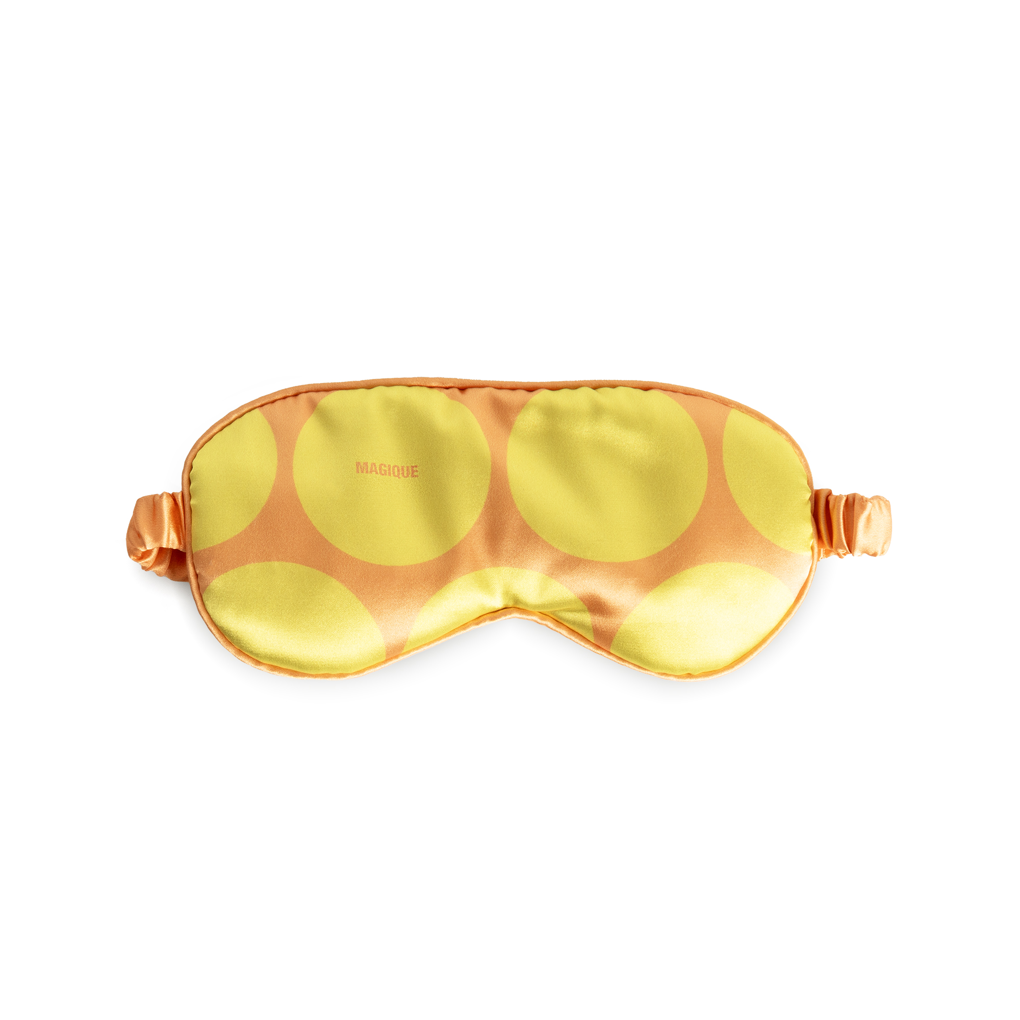 The Eye Mask - Golden Dot features yellow satin with bold orange polka dots and an elastic band—an ideal, stylish accessory for Tallinn shopping enthusiasts seeking unique finds. Gate21.ee