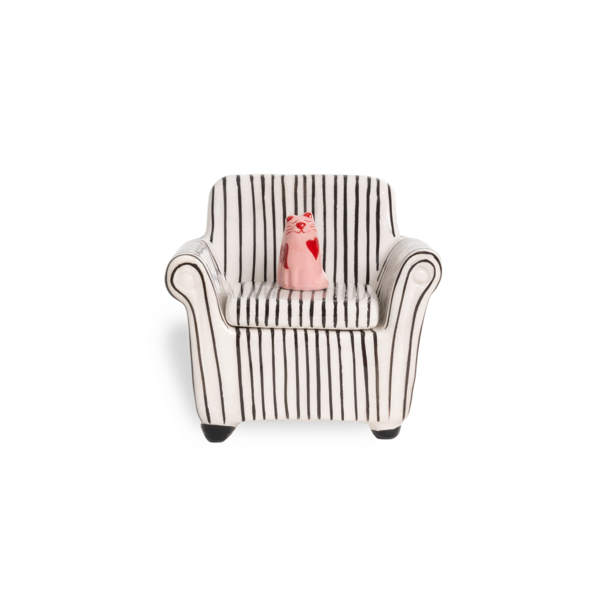 A small pink figurine with a red heart sits on the Blue Chair - Jewellery Box, a white box adorned with vertical black stripes. Perfect for gift shop shelves or concept store displays. Set against a plain white background. Gate21.ee