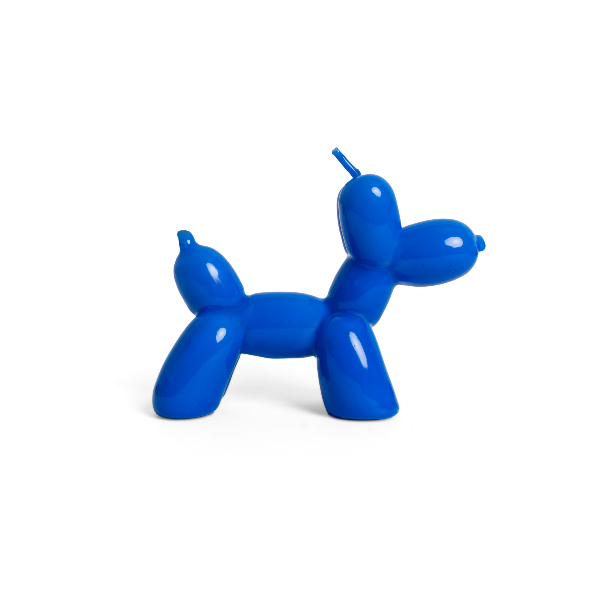 The Balloon Dog Candle - Electric Blue stands upright against a white background, making it a standout piece for curated gift shops or a unique find reminiscent of Tallinn shopping adventures. Gate21.ee