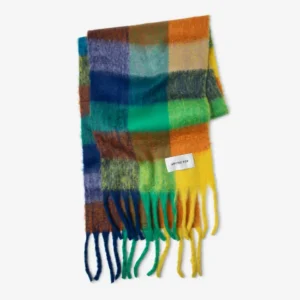 The Reykjavik Scarf - Nordic Skies is a multicoloured, fuzzy chequered scarf in blue, green, yellow, orange, and brown with long fringes and a white ARCTIC FOX label. Gate21.ee