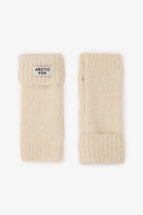 A pair of Pebble Beige Reykjavik Hand Warmers with ribbed cuffs and a fingerless knitted design. One glove displays the Arctic Fox label; the other is shown palm side up. Gate21.ee