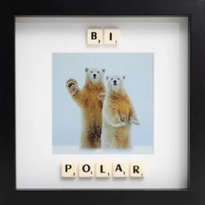 The BI POLAR - Scrabble Print features two upright polar bears with Scrabble tiles spelling "BI" above "POLAR." This framed print is a playful, memorable way to add charm and conversation to your space. Gate21.ee