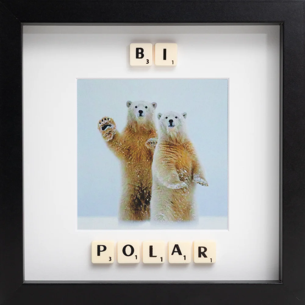 The BI POLAR - Scrabble Print features two upright polar bears with Scrabble tiles spelling "BI" above "POLAR." This framed print is a playful, memorable way to add charm and conversation to your space. Gate21.ee
