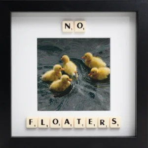 Capture a special moment with the "NO FLOATERS - Scrabble Print," featuring five yellow ducklings on water. Scrabble tiles above and below spell out NO FLOATERS—perfect for evoking fun memories!. Gate21.ee