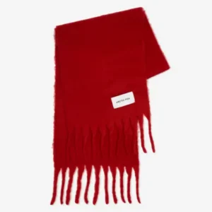 The Stockholm Scarf - Crimson Red features a bright red colour, long thin fringes at both ends, and a white rectangular “ARCTIC FOX Stockholm” label, shown against a plain white background. Gate21.ee