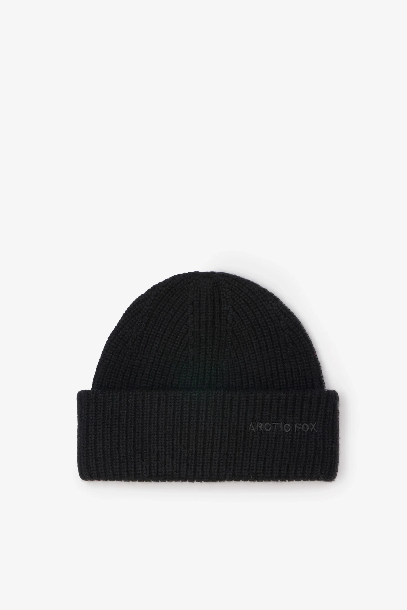 The Arctic Black - Merino Beanie is a black, ribbed knit hat with a folded brim and “ARCTIC FOX” embroidered on the front right, shown against a plain white background—ideal for Arctic Fox beanie fans. Gate21.ee