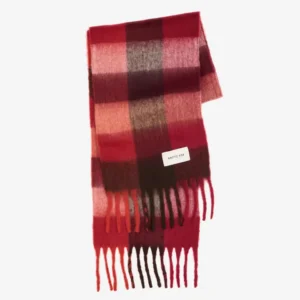 The Reykjavik Scarf - Burgundy Check is a wool scarf with a red, pink, and black check pattern, fringe at the ends, and a white rectangular ARCTIC FOX label. Gate21.ee