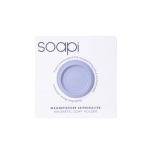 A round, light purple Soapi - Lavender magnetic soap holder is centred in white packaging labelled "soapi," made from about 90% recycled materials and known for impressive durability. Gate21.ee