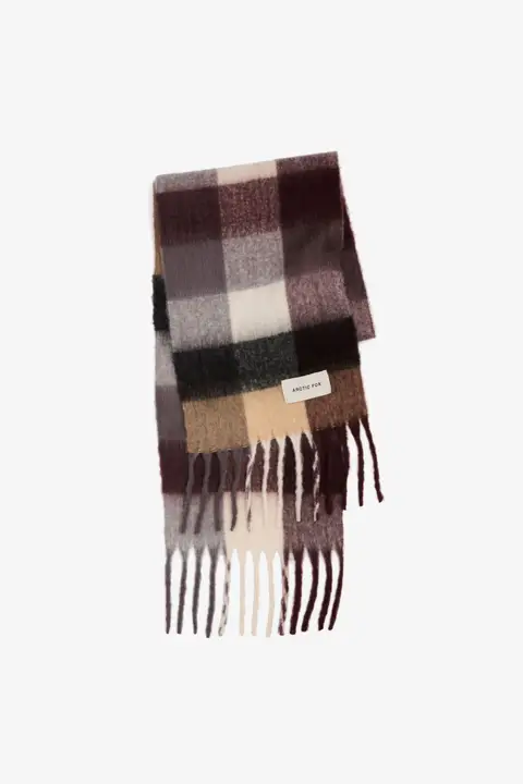 The Reykjavik Scarf - Purple / Brown features a large chequered pattern in brown, beige, black, and cream with fringed ends and a visible white label. Gate21.ee