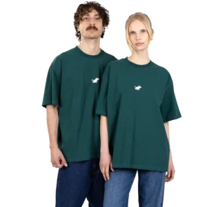 A man and a woman stand side by side, both wearing oversized green Moomin Heavy Ts with a small white graphic on the chest and blue jeans. The background is plain white. Gate21.ee