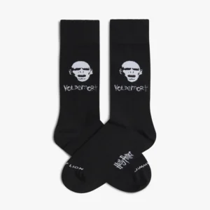 A pair of black Harry Potter - Voldemort socks with a white skull-like face graphic, "Voldemort" text, and the Harry Potter logo on the foot. Gate21.ee