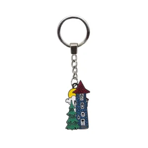 The Moomin Keyring - Moomin House features a metal keyring with a colourful charm of a blue tower, red roof, green tree, yellow sun, and white cloud. The charm hangs from a short chain attached to a round keyring. Gate21.ee
