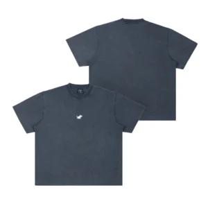 Front and back view of the Moomin Ts - Stone Wash Blue, a loose-fitting T-shirt with a small white embroidered animal logo on the front left chest, featuring short sleeves and a classic crew neck. Gate21.ee