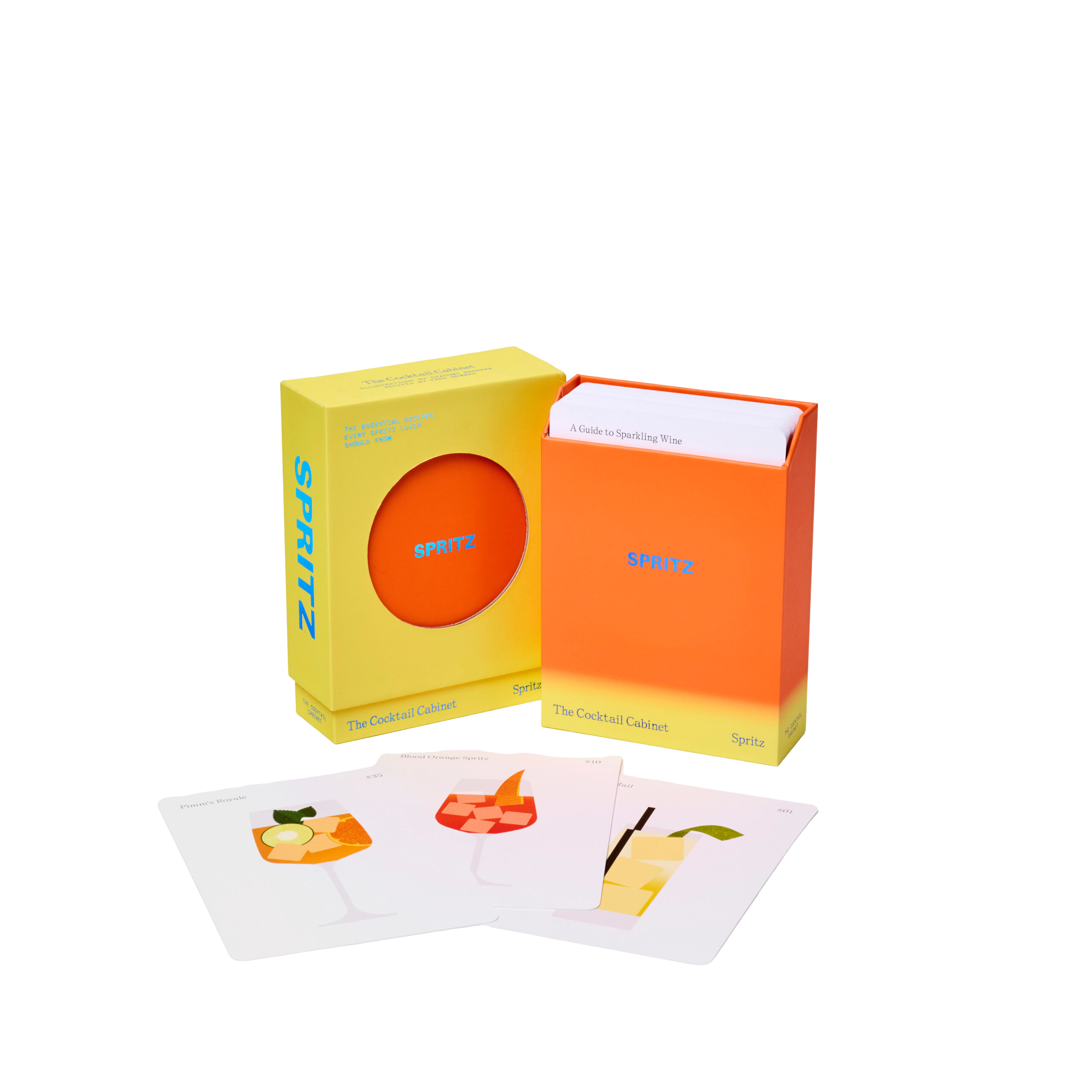 The Cocktail Cabinet: Spritz is a boxed set featuring a deck of cocktail recipe cards with vibrant drink illustrations. Three colourful cocktail cards are displayed in front of the packaging. Gate21.ee