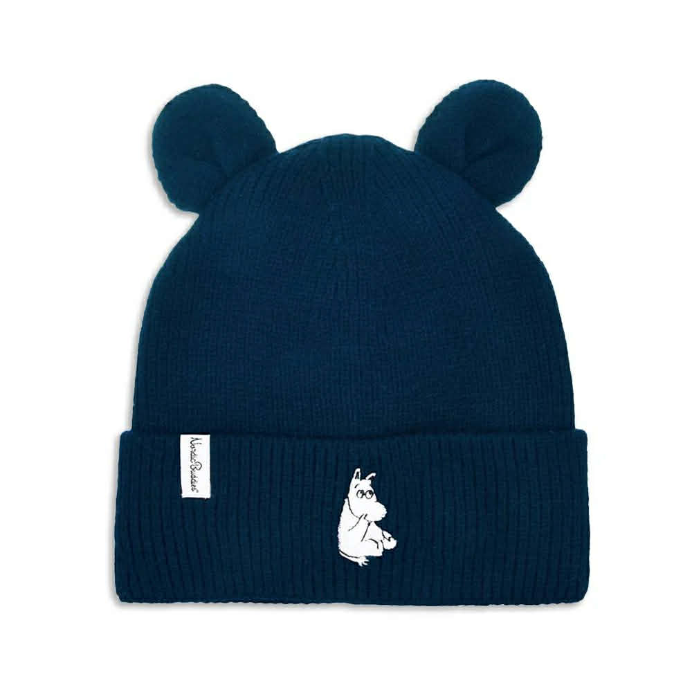 The Moomin Kids Beanie - Pink is a cosy knitted hat with two bear-like ears, a white embroidered Moomin character on the folded brim, and a white rectangular tag on the left side—perfect for accessorising with matching keyrings. Gate21.ee