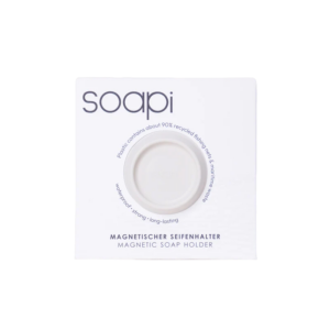 The Soapi - Off White box includes a round magnetic soap holder made from about 90% recycled fishing nets. Its waterproof, durable design combines sustainability with everyday convenience. Gate21.ee