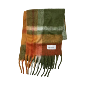 The Stockholm Scarf - Mossy Spring is a rectangular, multicoloured checked scarf in green, orange, brown, and white with fringed ends and an Arctic Fox Stockholm label. Shown on a plain white background. Gate21.ee