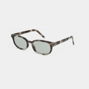 The A. Kjærbede Charlie - Cookie Dough sunglasses feature oval-shaped, light grey lenses and a marbled brown and black frame, displayed on a plain white background. Gate21.ee