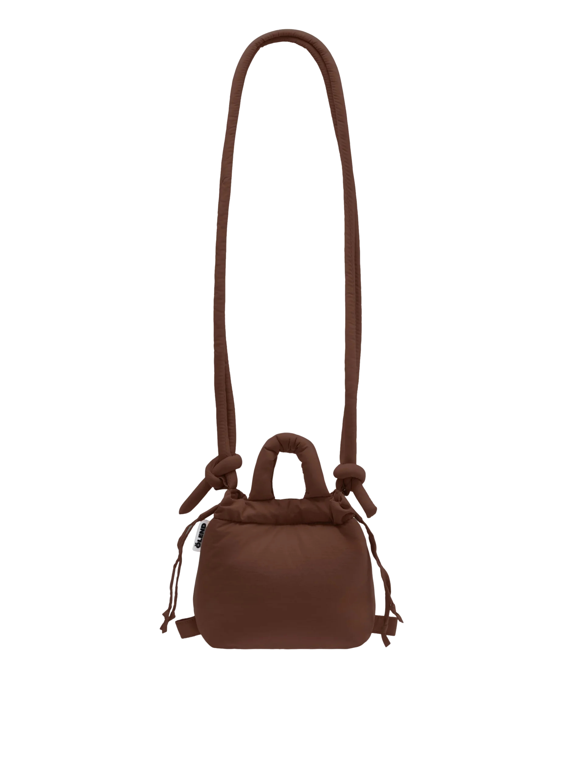 The Micro Ona Soft Bag - Chocolate is a small brown bag with a puffy texture, two knotted handles, an adjustable long strap, and side drawstring fastening, shown against a plain white background. Gate21.ee
