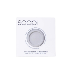 A white package labelled soapi contains a round, grey magnetic soap holder. Text on the packaging highlights recycled plastic, waterproof and strong features, and provides product name in English and German. Gate21.ee