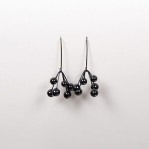 ABE jewellery - Berries: Minimalist earrings with clusters of glossy black beads suspended from thin black wires, showcased on a plain white background. Gate21.ee
