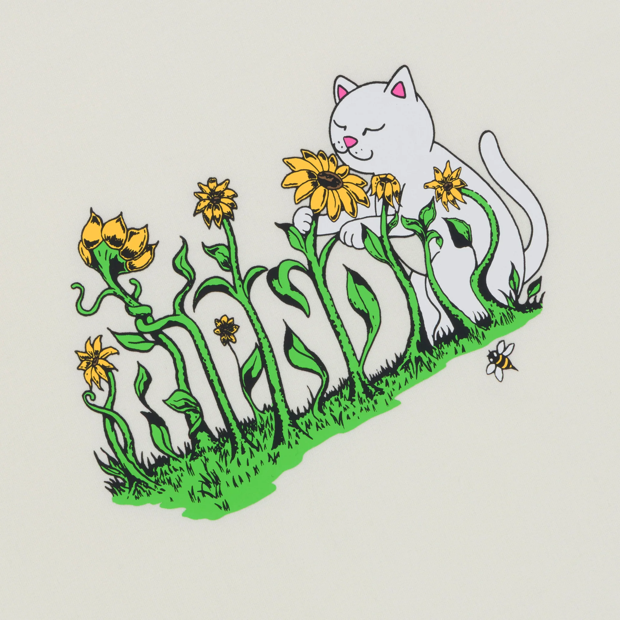 A white cat, inspired by Ripndip, sits among yellow flowers. "KIND" is spelt out in green stems with leaves in the grass, whilst a bee buzzes nearby—capturing the playful vibe of the Flower Boy Tee - Bone. Gate21.ee