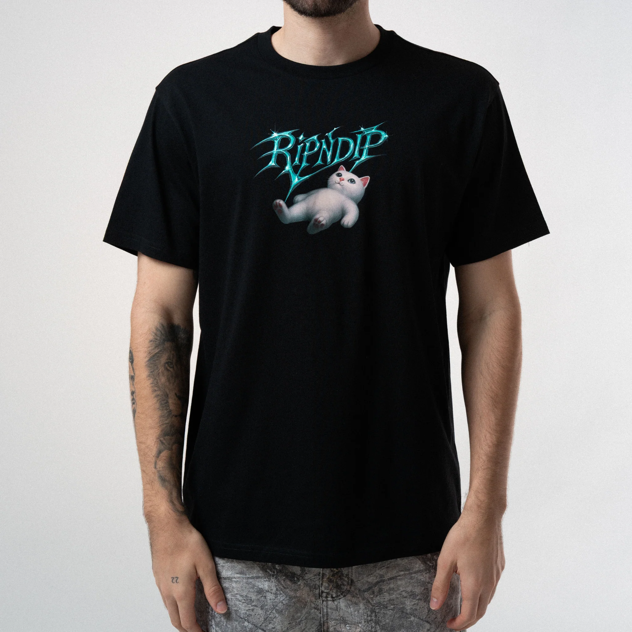 A person wears the Space Vision Tee - Black wash. Only their torso and arms are visible. Gate21.ee