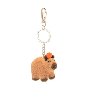 The Capybara - Felt key ring features a small brown felt capybara with dark brown feet and nose, closed eyes, an orange item on its head, and is attached to a metal chain and clasp. Gate21.ee
