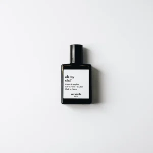A dark glass 30ml YMC Bon Oh My Chai roll-on EDP bottle labelled "oh my chai," with additional text, photographed against a plain white background; a unique unisex fragrance. Gate21.ee