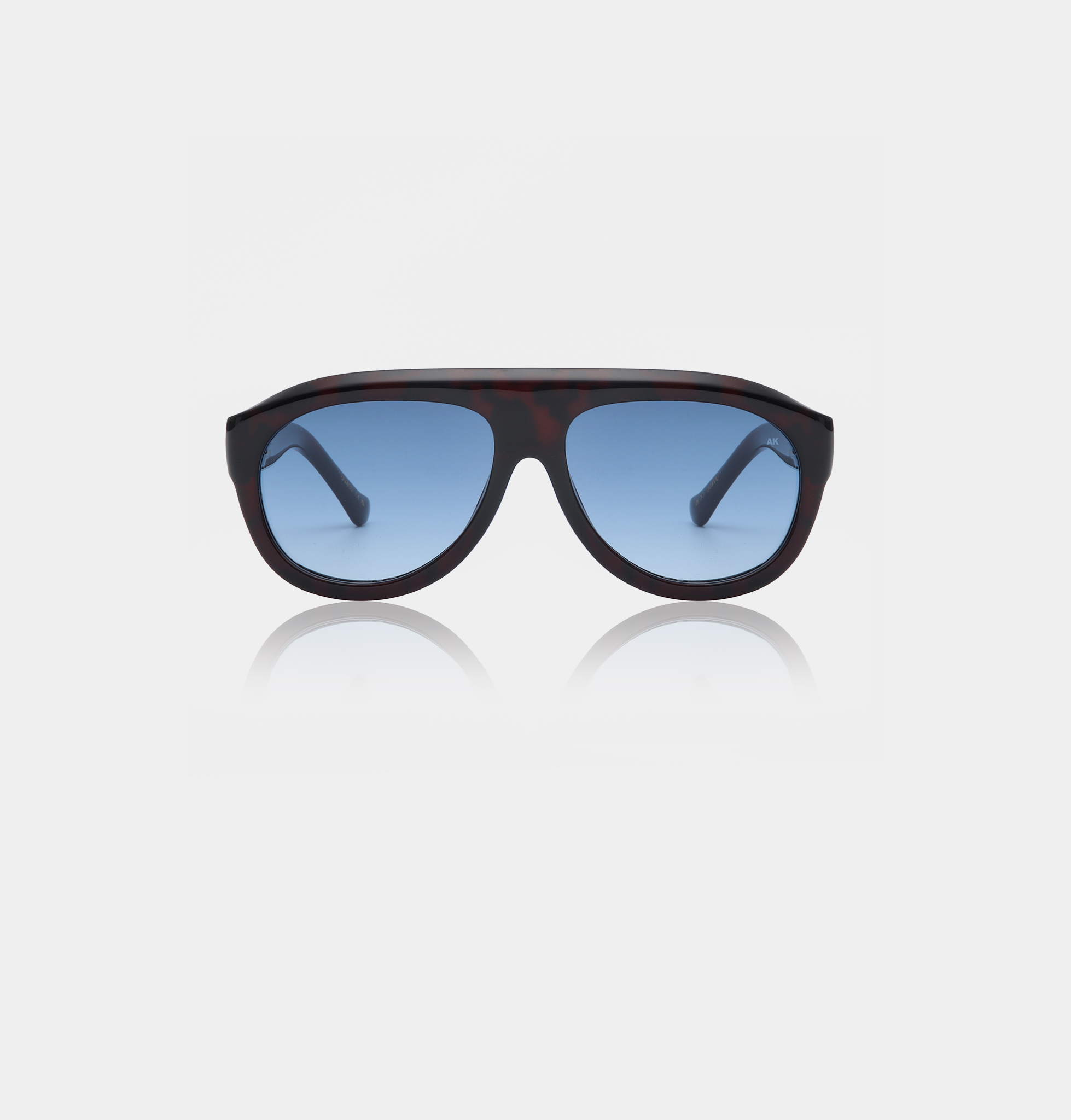 Front view of the A. Kjærbede Rio - Demi Tortoise sunglasses featuring a dark tortoiseshell frame and blue gradient lenses, displayed against a plain white background with a subtle reflection beneath the frame. Gate21.ee