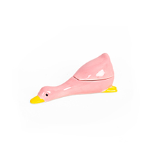 A small, pink ceramic Duck - Jewellery Box with a yellow beak and tail, reminiscent of the whimsical style found in the Dreamy cat jewellery plate by Hello Ferretti, is shown from the side on a plain white background. Gate21.ee