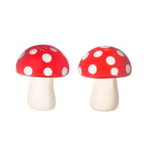 The Mushroom - Salt & Pepper Shakers feature two ceramic shakers shaped like mushrooms, with white stems and red caps adorned with white spots, displayed side by side on a white background. Gate21.ee