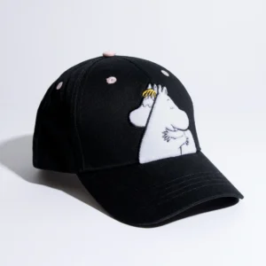 The Moomin Love Kids Cap is a black baseball cap embroidered on the front with a white cartoon character sporting a yellow-striped object on its head. Reminiscent of popular Moomin keyrings, it features pink dots on the crown and is displayed against a plain white background. Gate21.ee